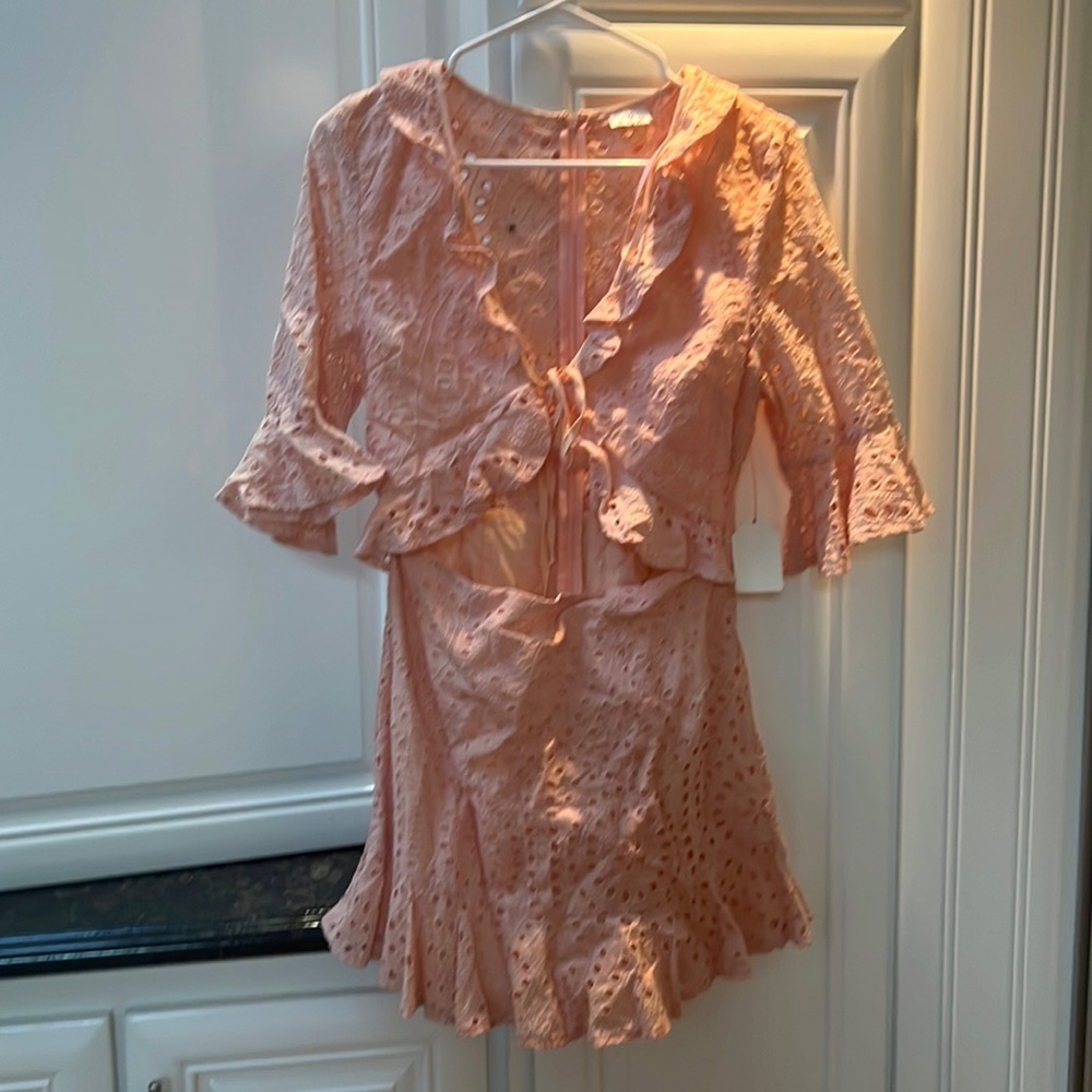 Peach eikette ruffle dress with tie in front detail